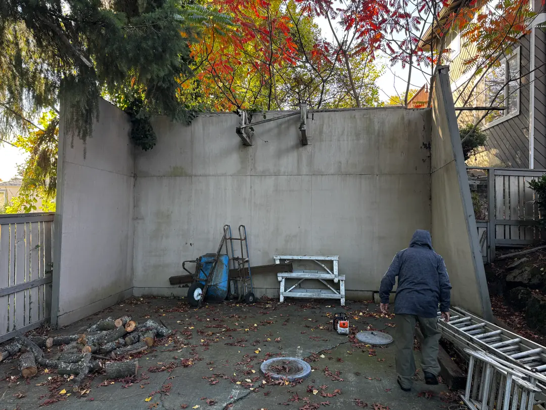 Before: Small Structure Dismantling & Odd Jobs Demolition (Outdoor Basketball Court Half-Wall Enclosure (Framing, Posts, Chain-Link)) in Renton, WA - M&M Junk Removal